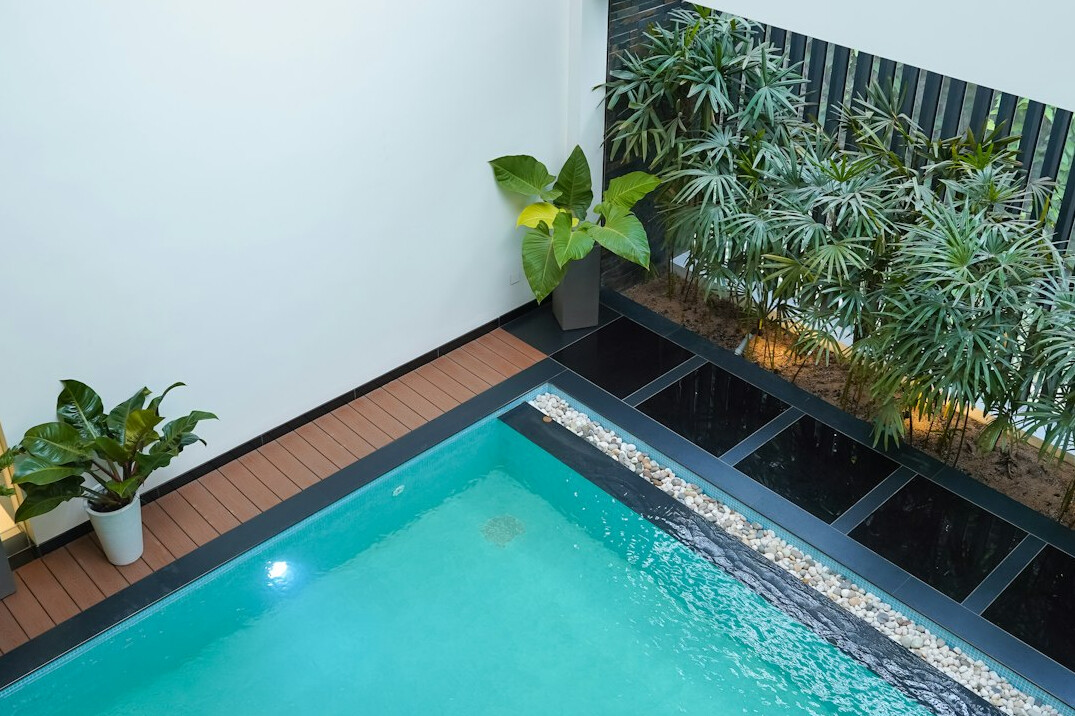 Modern hotel exterior with swimming pool