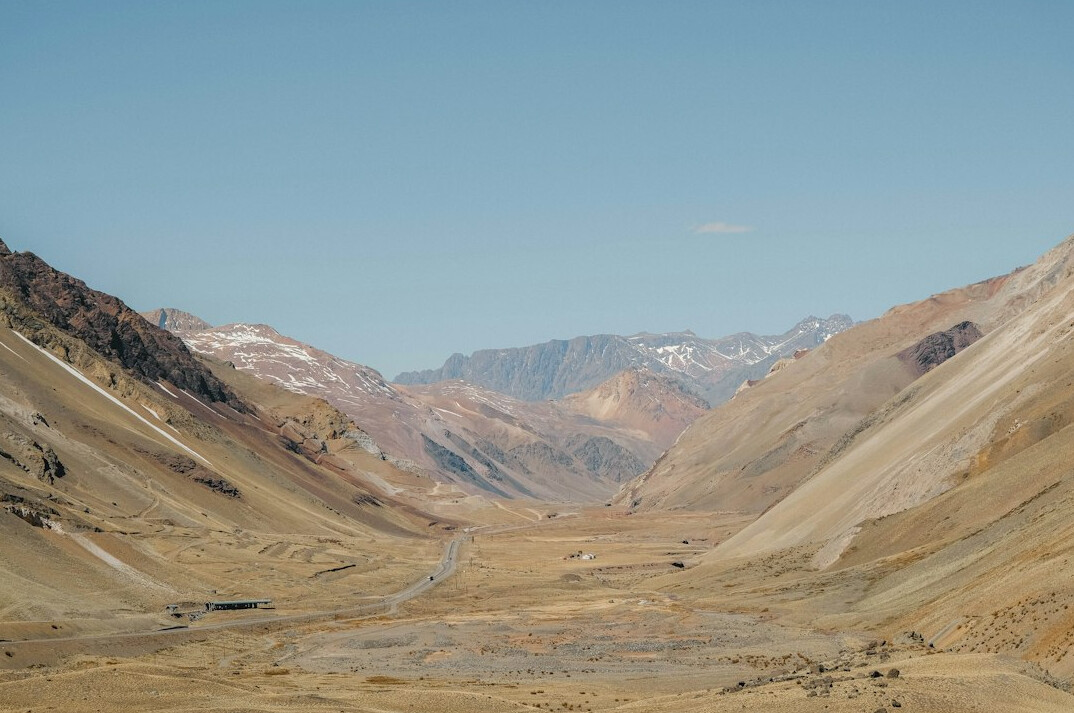 Scenic road trip route through mountains and valley